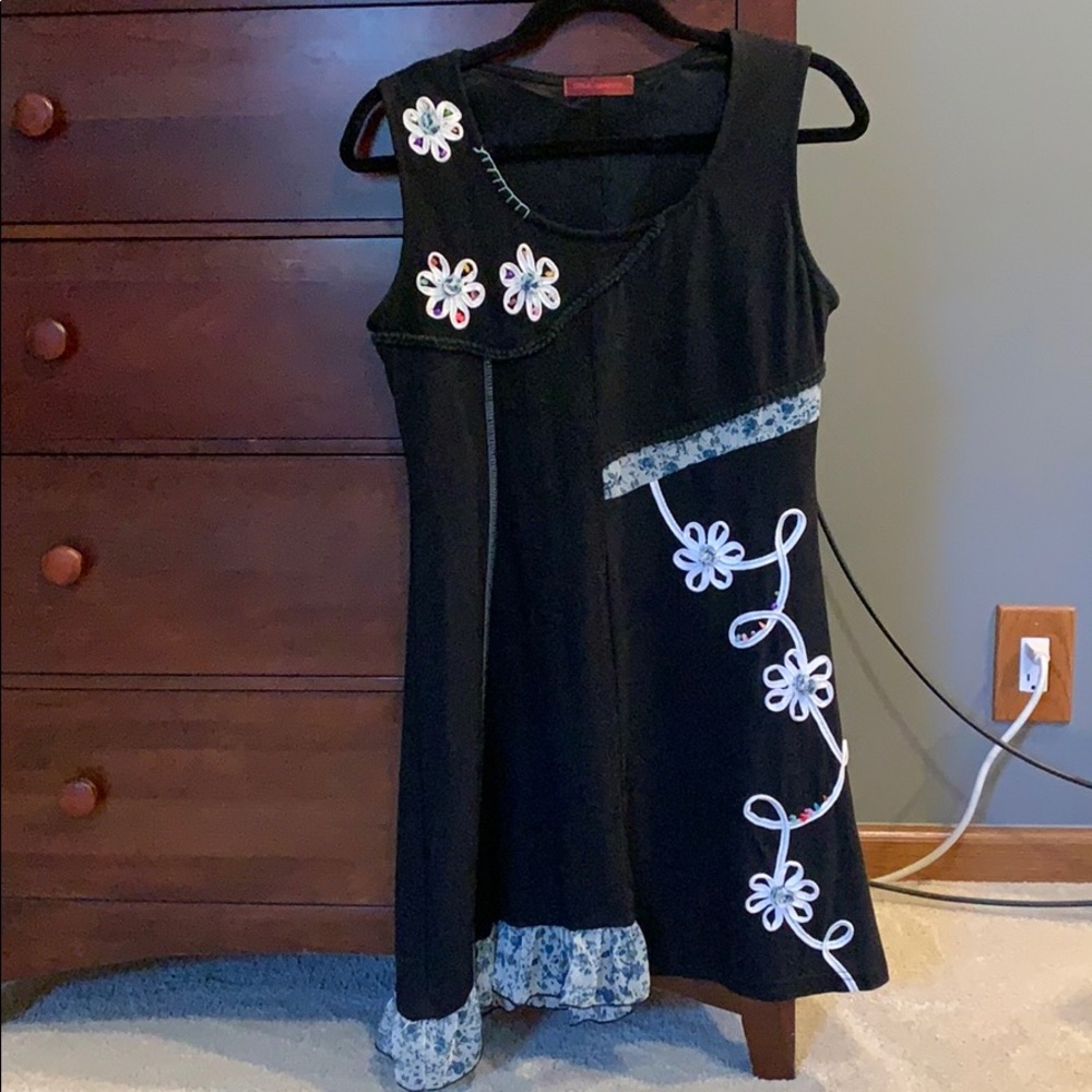 Dress with darling detail.  Size medium/8